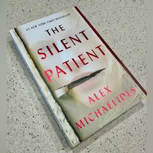 The Silent Patient paperback book - Alex Michaelides